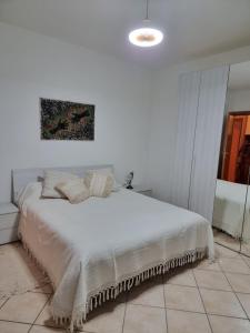 Postel nebo postele na pokoji v ubytování Casina Manu