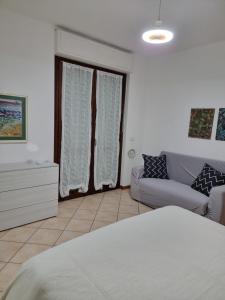 Postel nebo postele na pokoji v ubytování Casina Manu