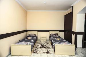 Postel nebo postele na pokoji v ubytování VƏTƏN Hotel