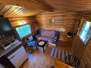 an overhead view of a living room in a log cabin at Tana Familiecamping in Tana