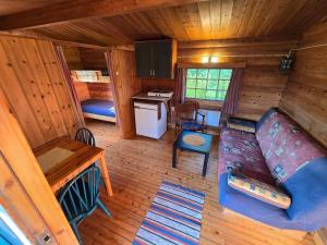 an overhead view of a living room and kitchen in a cabin at Tana Familiecamping in Tana