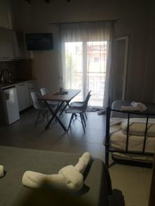 Postel nebo postele na pokoji v ubytování Smaragdi apartment