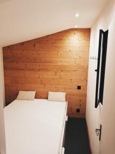 Una cama o camas en una habitación de Les biches du Soula 5 couchages proche piste ski