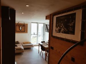 Un lugar para sentarse en Les biches du Soula 5 couchages proche piste ski