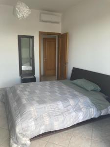 Postel nebo postele na pokoji v ubytování S a f e t y House Treviglio Milano