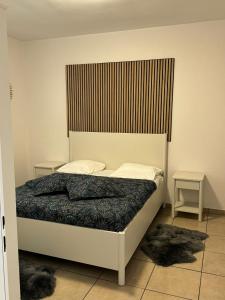 Postel nebo postele na pokoji v ubytování B&B Gino