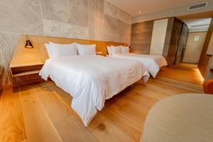 Katil atau katil-katil dalam bilik di GO Quito Hotel