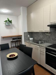 Kuchyň nebo kuchyňský kout v ubytování B&B Gino