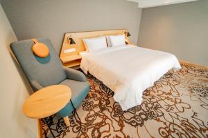Katil atau katil-katil dalam bilik di GO Quito Hotel