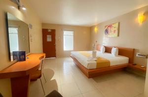 Auto Hotel Mediterráneo客房内的一张或多张床位