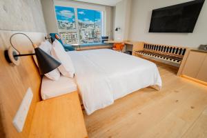 Katil atau katil-katil dalam bilik di GO Quito Hotel