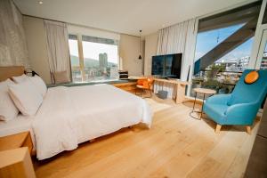 Katil atau katil-katil dalam bilik di GO Quito Hotel