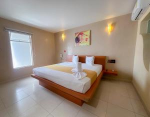 Auto Hotel Mediterráneo客房内的一张或多张床位