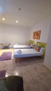 Postel nebo postele na pokoji v ubytování Villa Lavanda + 7 fotografií