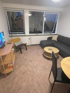 TV a/nebo společenská místnost v ubytování Neckelmanns BnB Room 63 + 5 fotografií