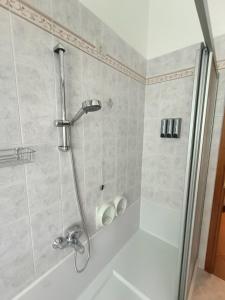 Koupelna v ubytování B&B Il Melograno + 13 fotografií