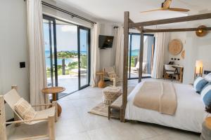 Ein Bett oder Betten in einem Zimmer der Unterkunft Tamarind Hills Resort & Villas