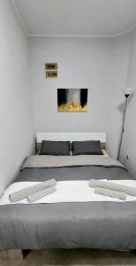 Postel nebo postele na pokoji v ubytování Apartman SPLENDID