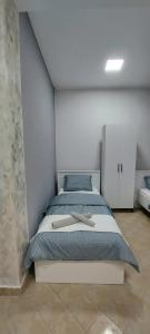 Postel nebo postele na pokoji v ubytování Apartman SPLENDID