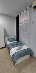 Postel nebo postele na pokoji v ubytování Apartman SPLENDID