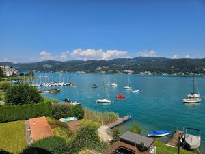 a view of a harbor with boats in the water at Seehaus Gori in Maria Wörth