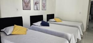 Postel nebo postele na pokoji v ubytování Apartamento Praça da Bíblia