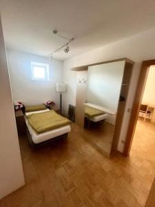 Posteľ alebo postele v izbe v ubytovaní Apartment Römerhaus