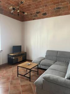 TV a/nebo společenská místnost v ubytování Le volte in Toscana