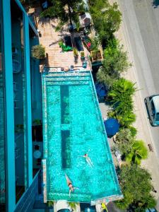 an overhead view of a swimming pool at a resort at Ilio Boutique Hotel in Ksamil