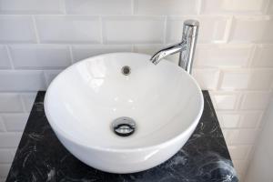 A bathroom at ÁTICO DE LUX SANXENXO
