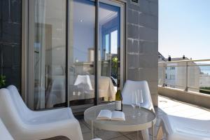 A balcony or terrace at ÁTICO DE LUX SANXENXO