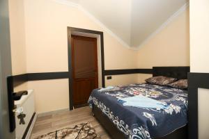 Postel nebo postele na pokoji v ubytování VƏTƏN Hotel
