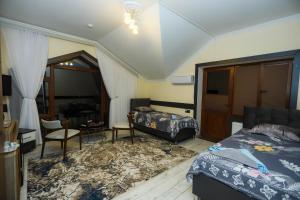 Postel nebo postele na pokoji v ubytování VƏTƏN Hotel