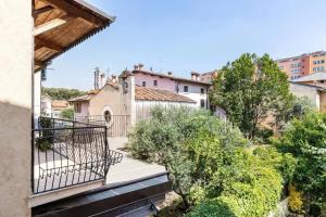 a view from the balcony of a house at Charming Apartment in Verona with Terrace in Verona