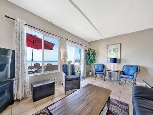 a living room with a view of the ocean at 3607 Seashore A & B in Newport Beach