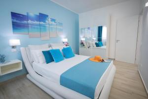 Posteľ alebo postele v izbe v ubytovaní Golden Holiday 2 Ville con piscine indipendenti e separate