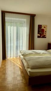 Posteľ alebo postele v izbe v ubytovaní Apartment Römerhaus