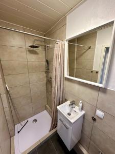 Ένα μπάνιο στο Ferienwohnung Kleine Hafenperle +14 φωτογραφίες