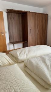 Posteľ alebo postele v izbe v ubytovaní Apartment Römerhaus