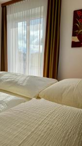 Posteľ alebo postele v izbe v ubytovaní Apartment Römerhaus