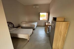 Postel nebo postele na pokoji v ubytování Hostel o Viveiro - Serra da Capivara - Centro Sócioambiental