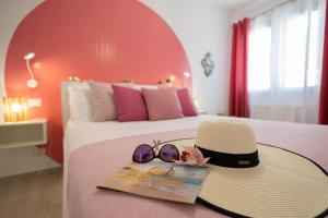 Posteľ alebo postele v izbe v ubytovaní Golden Holiday 2 Ville con piscine indipendenti e separate