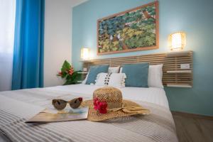 Posteľ alebo postele v izbe v ubytovaní Golden Holiday 2 Ville con piscine indipendenti e separate