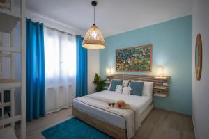 Posteľ alebo postele v izbe v ubytovaní Golden Holiday 2 Ville con piscine indipendenti e separate