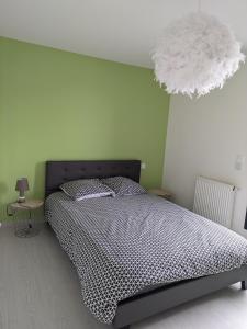 Postel nebo postele na pokoji v ubytování Chez Gaëlle + 10 fotografií