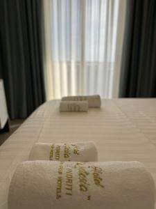 Postel nebo postele na pokoji v ubytování Hotel Qetesia-Te Indriti