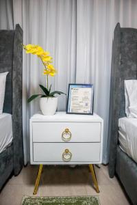 Postel nebo postele na pokoji v ubytování Residencial Nany