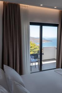 Postel nebo postele na pokoji v ubytování Arrei Hotel