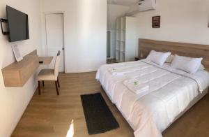 Postel nebo postele na pokoji v ubytování Casa Parral Hostal