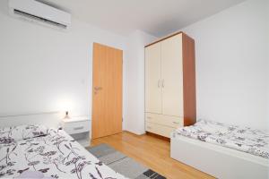 Postel nebo postele na pokoji v ubytování Čarobni pogled Zagreb